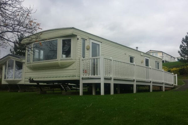 The Holiday Homes Trust accessible caravan exterior at holiday park